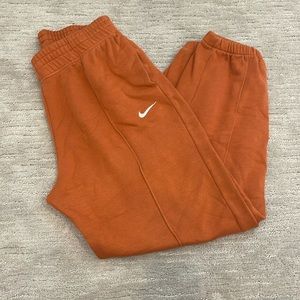orange nike sweatpants